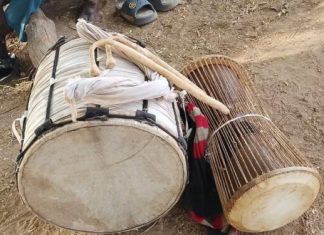 UBIDS Lecturer, Prof. Tony Tampah Donates Traditional Instruments to Kandomwine Bawaa Group