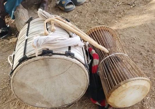 UBIDS Lecturer, Prof. Tony Tampah Donates Traditional Instruments to Kandomwine Bawaa Group